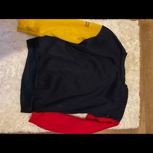 Size small red blue and yellow crew neck
